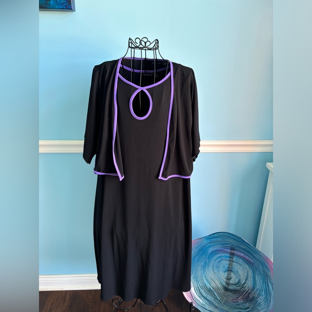 Citiknit black dress with lavender piping.